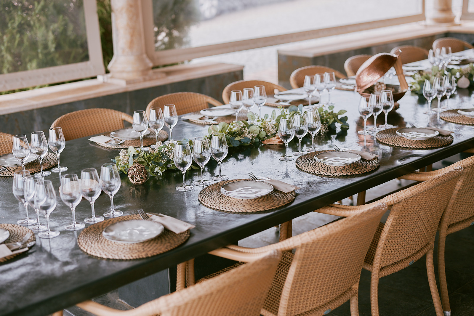 Table setup with wine glasses and minimalist decoration